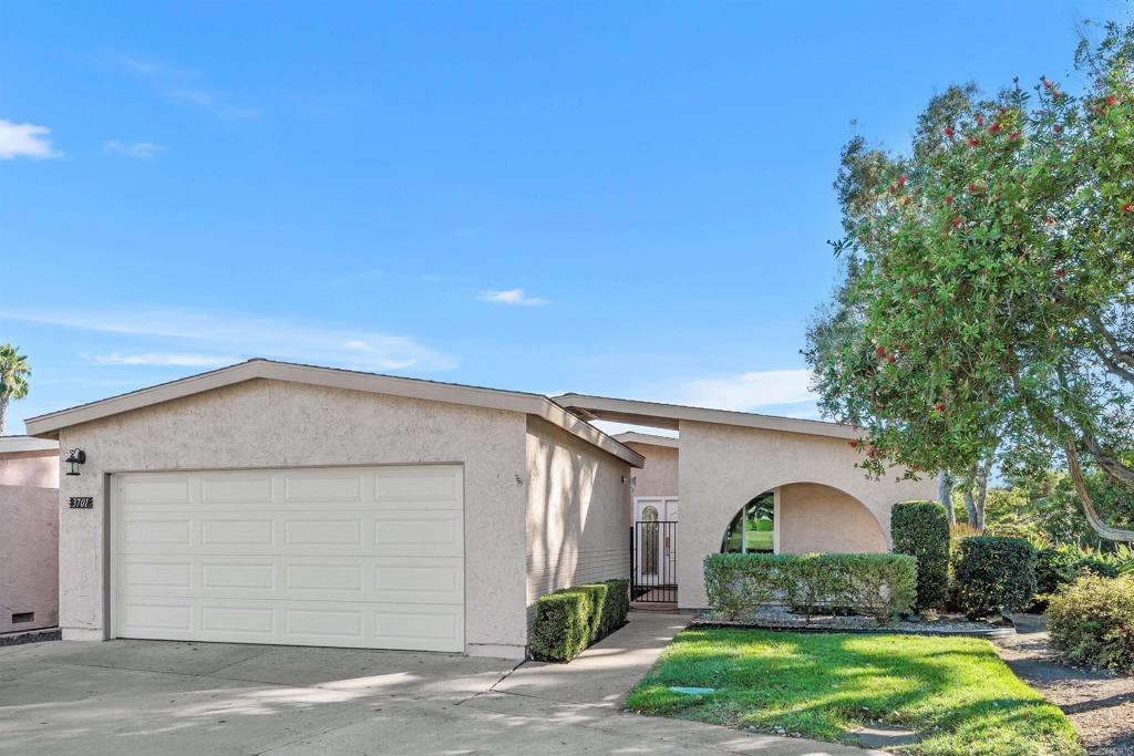 Must-See Opportunity! Welcome to one of the LARGEST DETACHED HOMES & END UNIT in the highly sought-after Oceana East 1 neighborhood. This 2 BED, 2 FULL BATH home boasts of 1347 sq.ft and one of the LARGEST LOTS at the end of the street for incredible privacy. The modern remodeled residence features a detached 2 CAR GARAGE complete with a utility sink for added functionality. Inside, the open floor plan offers a spacious kitchen which features custom cabinetry, quartz countertops and a large island for entertaining. The open floor plan is enhanced by beautiful wood flooring, and tasteful upgrades throughout. Perfect for entertaining family & friends. The primary bedroom suite features a large, walk-in closet, offering ample storage space. Step outside to enjoy 2 private backyard patios. One off the living/dining room and a large shaded covered patio off the kitchen perfect for BBQ/outdoor entertaining, both offering outstanding mountainous views for relaxing or entertaining guests. Additional features include paid in full Solar installed in 2020 providing both air & heating, ensuring comfort year-round. Residents enjoy a low-priced HOA $420.00 fee that covers a wide range of resort-style amenities, including a pool (heated seasonally from approximately April to October), spa, & shaded cabanas. The clubhouse offers space to host private events and is equipped with a billiards table, darts, games, a TV and more. HOA dues also include water, trash, sewer & basic cable/TV. Newer washer & dryer, refrigerator, microwave & dishwasher ALLL covey with home. Don't miss this rare opportunity to own this beautifully upgraded home in one of the most desirable 55+ Coastal Oceanside Communities. Only a few minutes to Oceanside/Carlsbad beaches, shopping and restaurants. VIEW HOME VIDEO & VIRTUAL TOUR