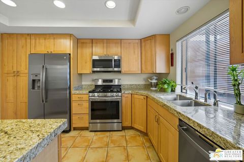 Photo of 4881 S Winners Circle #E, Palm Springs, CA 92264 (MLS # 25606893PS)