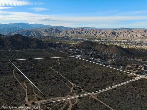 Photo of 56007 Golden Bee Dr, Yucca Valley, CA 92284 (MLS # JT26033327)