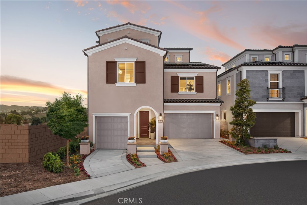 Welcome to Elevate — The Terraces at Walnut, a stunning new community located in the highly desirable Walnut neighborhood, served by the top-rated Walnut Valley Unified School District. This luxurious Plan 2 home offers an elevated living experience, featuring 4 bedrooms, 4 full bathrooms, 2 powder rooms, 3,530 sq. ft. of living space, and an attached 3-car garage. The flexible layout includes one bedroom on the first floor, two bedrooms on the second floor, and a fourth bedroom on the third floor. The gourmet kitchen, appointed with upscale cabinetry and designer countertops, is perfectly designed for open-concept living and entertaining. The first floor also features a separate guest or in-law suite, providing privacy and versatility for multi-generational living.
An expansive third-floor loft includes a large deck, an additional bedroom, and bath—ideal for a home office, entertainment space, or private retreat. The peaceful backyard offers the perfect setting for outdoor living and social gatherings.
Residents of this gated community enjoy access to 7 parks, playgrounds, BBQ areas, and picnic spaces, perfect for outdoor activities and connecting with neighbors.
As brand-new construction, buyers have the exciting opportunity to personalize interior finishes and select optional features—including a private elevator—to suit their lifestyle.
Located in one of Walnut’s premier areas, this exceptional property offers close proximity to award-winning schools, shopping, dining, and local amenities.
Don’t miss your opportunity to own this stunning new home in the Walnut School District! Contact us today to schedule your private tour.
Note: Photos are of the model home and may not represent the actual home for sale.