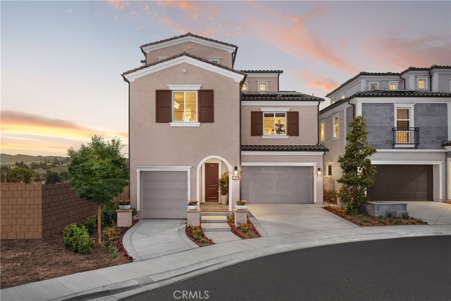 Welcome to Elevate — The Terraces at Walnut, a stunning new community located in the highly desirable Walnut neighborhood, served by the top-rated Walnut Valley Unified School District. This luxurious Plan 2 home offers an elevated living experience, featuring 4 bedrooms, 4 full bathrooms, 2 powder rooms, 3,530 sq. ft. of living space, and an attached 3-car garage. The flexible layout includes one bedroom on the first floor, two bedrooms on the second floor, and a fourth bedroom on the third floor. The gourmet kitchen, appointed with upscale cabinetry and designer countertops, is perfectly designed for open-concept living and entertaining. The first floor also features a separate guest or in-law suite, providing privacy and versatility for multi-generational living.

An expansive third-floor loft includes a large deck, an additional bedroom, and bath—ideal for a home office, entertainment space, or private retreat. The peaceful backyard offers the perfect setting for outdoor living and social gatherings.

Residents of this gated community enjoy access to 7 parks, playgrounds, BBQ areas, and picnic spaces, perfect for outdoor activities and connecting with neighbors.

As brand-new construction, buyers have the exciting opportunity to personalize interior finishes and select optional features—including a private elevator—to suit their lifestyle.

Located in one of Walnut’s premier areas, this exceptional property offers close proximity to award-winning schools, shopping, dining, and local amenities.

Don’t miss your opportunity to own this stunning new home in the Walnut School District! Contact us today to schedule your private tour.

Note: Photos are of the model home and may not represent the actual home for sale.