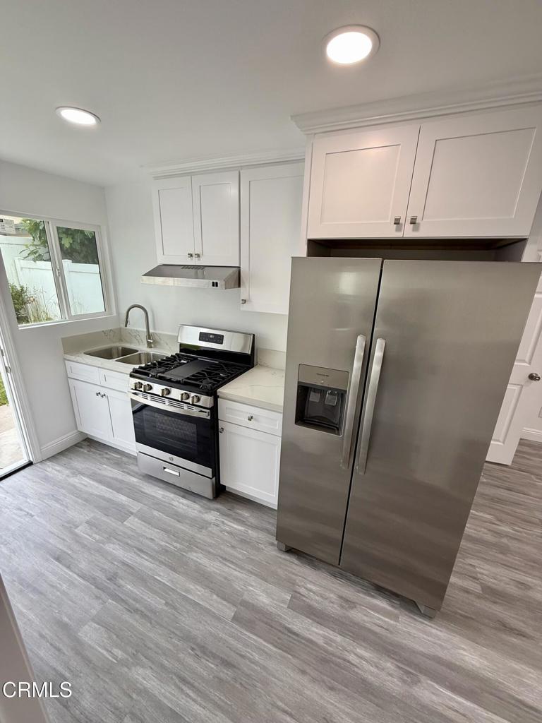 Unique chance to rent a beautiful Newly remodeled permitted ADU in desired Driftwood Swim and Racquet Club community. The converted ADU is new construction (2025) is fully permitted with AC unit, beautiful new luxury vinyl flooring throughout, white kitchen cabinets with new stainless steel appliances. The ADU features two bedrooms and one full bath, stackable washer and dryer inside the unit, living and dining area two or more parking spaces inside the gated driveway, recessed lighting throughout, and new double pane windows. Utilities are included in the lease! Access to amenities is included: gated key entry Tennis courts and heated pool/spa and big clubhouse. Clubhouse is available to host gatherings and has lots of tables and chairs. Picnic tables are available by the pool area. The entry to the gated amenities is keyed and for residents only. ADU is conveniently located right across the amenities and by walking distance to Seabridge Marina shopping and restaurants plaza. Hollywood beach is only 2.1 miles away. No pets are allowed.