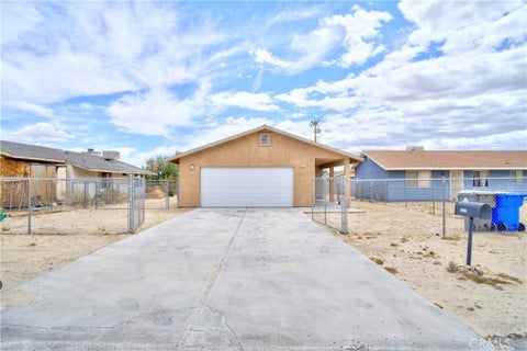 Photo of 6627 Smoketree Ave, 29 Palms, CA 92277 (MLS # JT26096905)