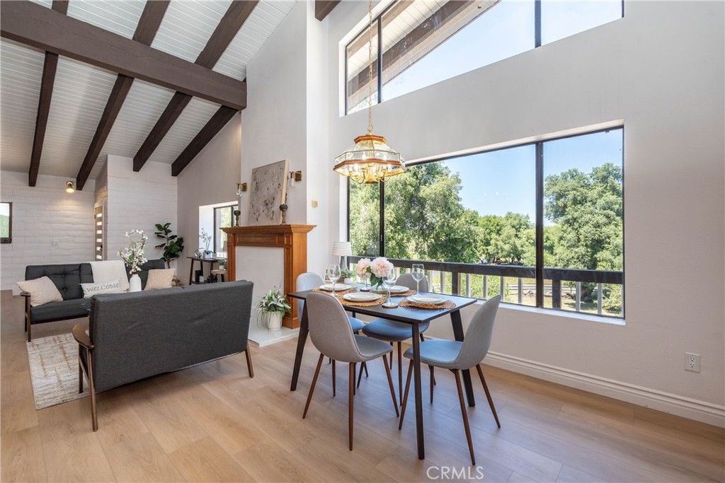 Experience the pinnacle of upscale country living in this exceptional 2,527 SqFt equestrian estate set on over 2 acres within a lush enclave. Surrounded by dozens of oak trees, this impeccably remodeled 4-bedroom, 3-bathroom home boasts timeless rustic elegance with modern sophistication.
Inside features exposed beams, rich wood paneling, and expansive windows creating a warm, light-filled ambiance. The thoughtfully designed layout includes a main-level bedroom and bathroom, the second floor with the other rooms, and a versatile third-floor loft perfect for a private study, play room, or retreat. The remodeled chef’s kitchen and open-concept living spaces showcasing stunning views flow seamlessly for elevated entertaining.
When you step outside of the home, you are greeted by your very own oasis featuring decks with views, a private pool and spa for relaxing or you can indulge in your your equestrian passions with a fully appointed barn, horse stalls, and all necessary accommodations for riding and boarding.
A rare 6+ car garage offers unmatched space for auto collectors, storage, or workshop needs. Surrounded by the Cleveland National Forest and located in ax exclusive HOA community designed for privacy, comfort, and equestrian excellence.