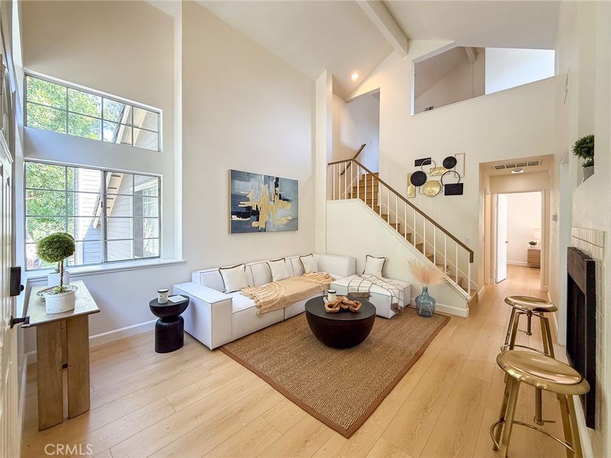 Welcome to this beautifully updated end-unit townhouse in the highly sought-after Walnut School District, offering both abundant natural light and exceptional privacy.This charming home features 2 spacious bedrooms, 2 bathrooms, and an additional loft/office space perfect for working from home or as a cozy reading nook. Step inside and be greeted by soaring high ceilings, fresh interior paint, brand-new flooring throughout, and the complete removal of all popcorn ceilings for a sleek, modern look.The inviting living area flows seamlessly to a private balcony on the second floor—ideal for enjoying your morning coffee or relaxing in the afternoon breeze. The generously sized primary suite features a large bay window that brings in abundant natural light.The U-shaped kitchen opens to a comfortable dining area, creating a warm and welcoming space for meals and gatherings.
 Downstairs, you’ll find a private 2-car garage with direct access. The beautifully landscaped community offers lush greenbelts, a sparkling pool, spa, and picnic areas, along with HOA-covered trash service.Enjoy the unbeatable super-convenient location—just minutes from top-rated schools, shopping, dining, and major freeways. Plus, Ronald Reagan Park, with its playground, tennis courts, and basketball courts, is just around the corner for outdoor fun and recreation.Don’t miss the opportunity to own this rare end-unit with the perfect balance of comfort, style, and location.