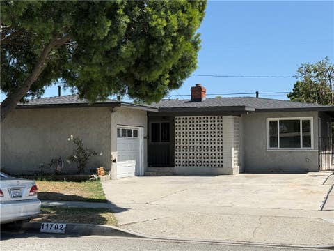 Photo of 11702 Mapledale ST, Norwalk, CA 90650 (MLS # DW26120276)