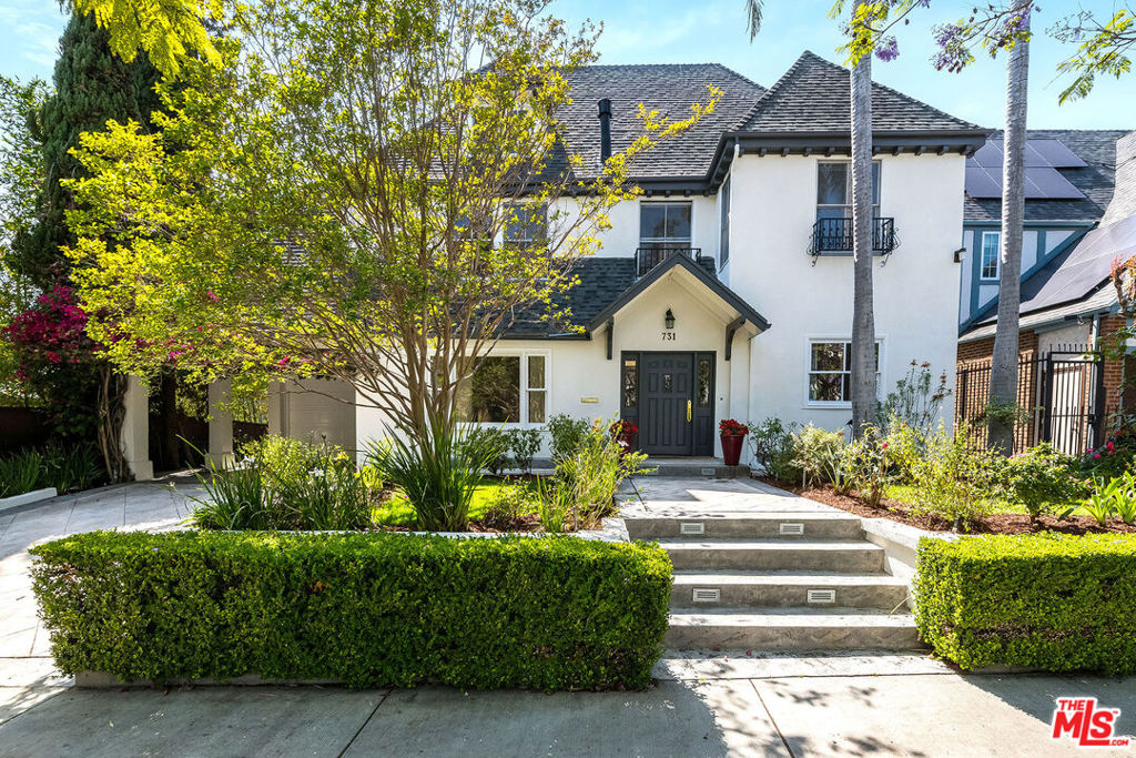 Fall in love with your Brookside home! One of 22 houses that have a running brook going through their yard, 731 Longwood is a traditional storybook house that oozes charm and character with a truly expansive gardens, patio, bridge over the stream and a pickleball court! Enter into a formal living room on the left, dining room on the right, powder room, and chef's kitchen with a breakfast room looking over the gardens. First floor offers a spacious light and bright family room with a cozy fireplace looking out to the beautifully landscaped yard. Adjacent is a sizeable bedroom/office with a bathroom. The second floor includes 4 generous bedrooms plus an office. Enjoy a unique primary suite with a sitting room, a walk-in closet and bathroom. The top/3rd floor has an oversized family room, equipped with a pool table, exercise room, and so much more!