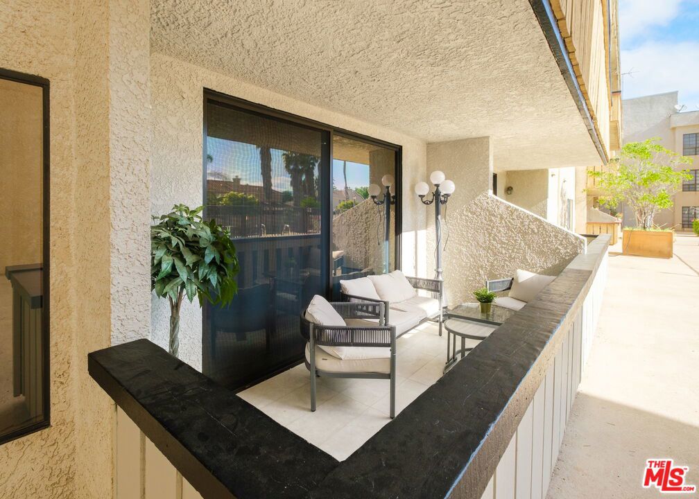 Welcome to your new oasis in the heart of Northridge! This stunning 2-bedroom, 2-bathroom condo spans 1,503 sq ft and offers a perfect blend of modern livingand convenience. Step inside and be greeted by the upgraded engineered wood floors and recessed lighting throughout, creating a warm and inviting ambiance.The kitchen has been tastefully upgraded to meet your contemporary lifestyle needs. Enjoy preparing meals in the modern kitchen with premium finishes! One of the highlights of this condo is the private patio, which provides serene views of the pool. Whether you're enjoying a morning coffee or an evening sunset, the patio is the perfect place to unwind. The community offers excellent amenities, including a pool and spa, ideal for relaxation and recreation and the building features controlled entrances and an elevator for your convenience, along with an in-unit washer and dryer for added comfort. You'll have two parking spaces in the garage, making parking a breeze. Located within close proximity to the Northridge Mall, coffee shops, and restaurants, as well as a short drive to Costco and CSUN, this condo places you in the center of it all! Experience the perfect blend of comfort, style, and location in this exquisite Northridge condo. Don't miss the chance to make it your new home!