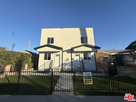 Photo of 409 E 99th Street, Los Angeles, CA 90003 (MLS # 25573033)