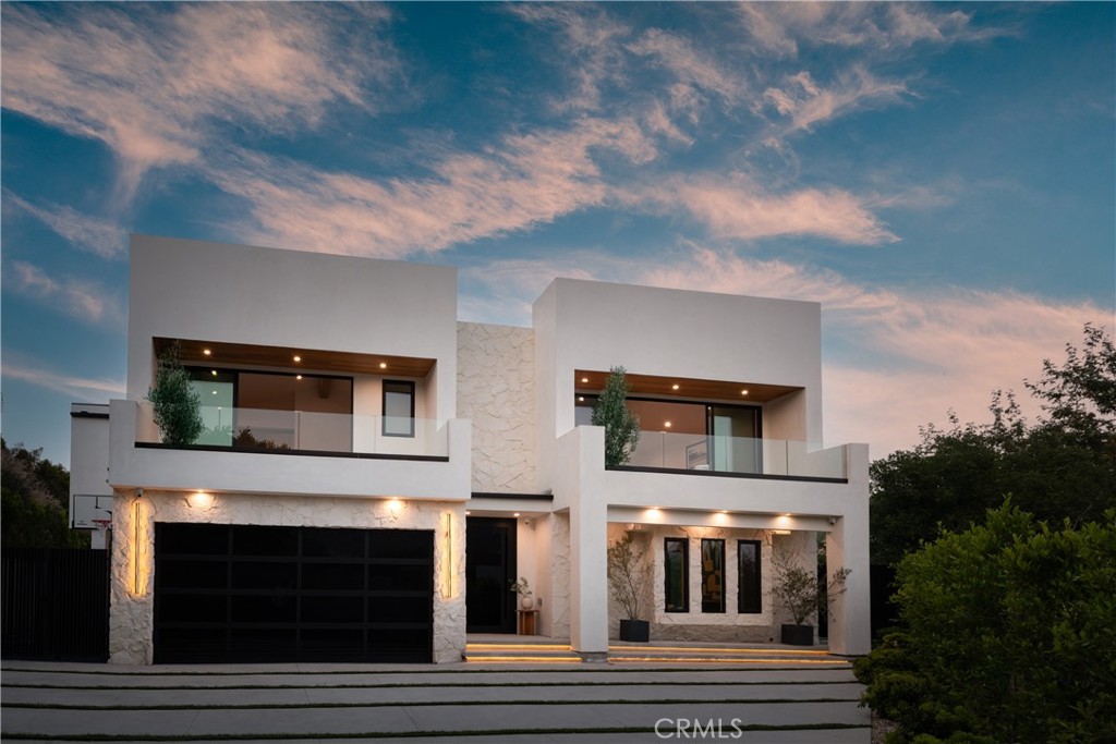 Luxurious modern oasis completely re-built nestled within an exclusive Nichols Canyon location and featuring explosive views. Situated down a long driveway providing utmost privacy and with a driveway large enough to accommodate 5+ cars. Impressive open floor plan and floor to ceiling glass doors allow for ample natural light to flood the home. Custom chef's kitchen displaying Thermador appliances, Taj Mahal countertops and spacious walk in pantry. Backyard is a true paradise with an infinity pool/spa looking out to explosive views , BBQ center, built-in Fire pit seating, fully covered patio and abundance of grass great for entertaining. Luxurious primary suite with vaulted ceilings, fireplace, oversized dual walk-in closet space and balcony looking out to the views. Spa-like bathroom boasting a walk-in shower, soaking tub and makeup vanity. This modern estate perfectly blends the indoor/outdoor lifestyle with modern comfort and the top notch amenities. Just minutes from the Sunset strip and LA's best restaurants, shops and nightlife.