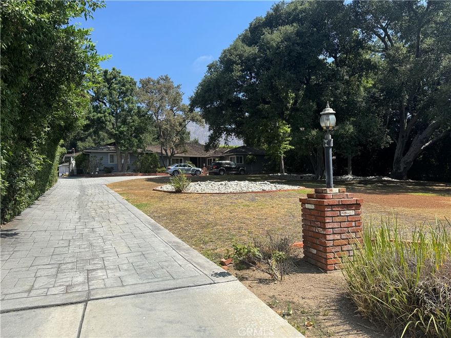 Located on one of the most desirable Feng Shui treasure lands in the prestigious Upper Rancho area of Arcadia, this property sits on an expansive, flat lot approximately 140 feet by 300 feet, gently elevated step by step from the street. Facing south, the lot is surrounded by mature trees on the east, north, and west sides, offering natural beauty, privacy, and symbolic protection of fortune and prosperity. The home features a well-designed floor plan with 5 bedrooms and 5 bathrooms, including 3 en-suite bedrooms. The spacious and open layout offers excellent potential for remodeling or rebuilding your dream estate. This is a must see in area.