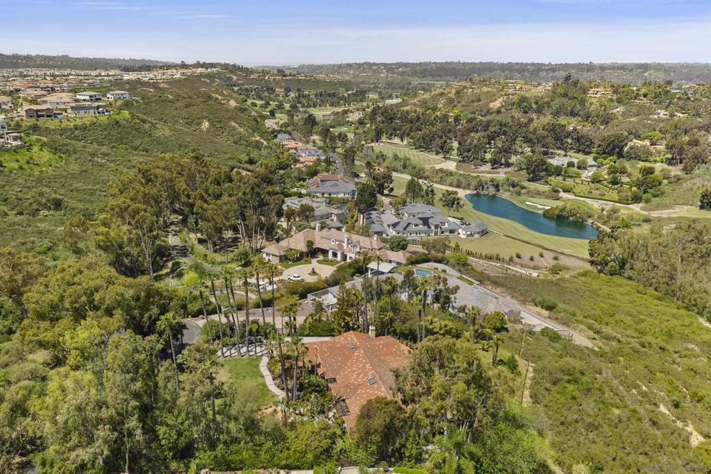 Beautiful Rancho Santa Fe Ranch-Style Home on Over 2 Acres Nestled at the end of a quiet cul-de-sac, this stunning one-level ranch-style home offers the perfect blend of privacy, space, and convenience. Set on more than 2 acres of beautifully landscaped grounds, the property boasts panoramic views and a serene atmosphere that feels like your own private retreat. Inside, the home has been thoughtfully updated with modern finishes while maintaining its classic charm. The open-concept layout is perfect for everyday living and entertaining, with spacious living areas, abundant natural light, and seamless indoor-outdoor flow. Located just minutes from top-rated schools, upscale shopping, dining, and some of Southern California's best beaches, this home truly has it all—comfort, convenience, and exceptional views—all in the heart of Rancho Santa Fe. "Enjoy resort-style living in this beautiful community featuring HOA amenities including a tennis court, scenic park, BBQ area, and a serene pond perfect for catch-and-release fishing. Ideal for active lifestyles and relaxing weekends alike!"