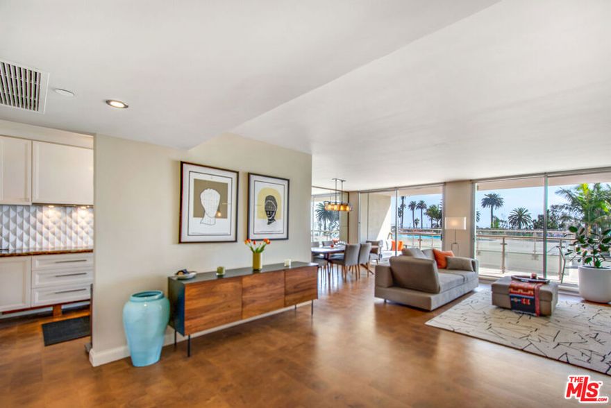 Experience coastal perfection in this absolutely stunning, redesigned Ocean View home at the prestigious Ocean Towers. This gorgeous property features 2 spacious ocean-view bedrooms and 2 to-die-for bathrooms, including a primary bath with an incredible ocean-view shower. The highest quality remodel is evident throughout, showcasing exquisite details like German cross-cut engineered wood floors insulated for sound and warmth, custom countertops and cabinetry, Lutron lighting, and electronically controlled window treatments. The bathrooms boast magnificent design elements, from granite and laser-cut marble floor tiles to custom Robern medicine cabinets. A large private balcony provides the perfect space to soak in the view. A True Sun-Drenched Oasis: The oversized balcony strategically faces south, providing abundant natural light year-round and direct sun exposure throughout the winter months. As night falls, the view transforms to include the colorfully lit Ferris wheel on the Santa Monica Pier, a truly magical sight! Ocean Towers offers a life of full-service luxury with amenities that include 24-hour Valet & Concierge, a state-of-the-art Fitness Facility, a Swimmer's Pool, Spa, and Banquet Room. Just out the front door is the splendor of Palisades Park overlooking the glorious Pacific Ocean. You're also just moments to Santa Monica's phenomenal beaches, world-class boutiques, and vibrant restaurants. Live the ultimate Santa Monica Beach lifestyle in the lap of luxury!
