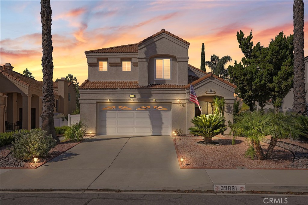 VALUE PRICED HOME!! SHOWS SO PRETTY!! BEAUTIFUL, WELL-CARED FOR 2 STORY HOME, NO HOA, LOW TAXES, HIGH HIGH CATHEDRAL CEILINGS!! ****ALL WINDOWS AND 2 SLIDING GLASS DOORS ARE ONLY ABOUT 1 YEAR OLD!! ALUMAWOOD PATIO COVER IS NEWER!! LEASED SOLAR!!! NO MORE EXPENSIVE ELECTRIC BILLS!! ALL THE BEDROOMS ARE LARGE!! The wall color throughout is a nice neutral color palette. You will be pleasantly surprised when you tour this home! Nice large tiled entryway. The front living room has 2 story ceilings, is light filled, offers a lovely fireplace and the first sliding glass door giving access to the rear yard. The dining room is right off the kitchen, has a tray ceiling and is very roomy with a backyard garden view. The kitchen has a very warm feeling, rich wood cabinet color, earthy granite counters, plenty of storage, tray ceiling with recessed lighting, space for an eat-in dining table with another sliding glass door to the backyard. The family room is next to the kitchen area for easy open access and convenience. On the 2nd floor, you'll love and appreciate MORE TALL ceilings!! The primary is oversized with cathedral ceilings, giving it such a large open feeling. The en suite has been updated with a custom shower enclosure, tub surround, dual sinks with a stone countertop and a separate vanity seating area! Down the hallway, the full bathroom has a large white vanity with dual sinks and a separate room for the shower. You will find the other 3 bedrooms upstairs opposite the primary bedroom. All bedrooms have ceiling fans! The backyard is so nice and manicured. You'll love the cover of the newer Alumawood patio cover, stamped & colored patio concrete, mature trees and low maintenance turf. The entire property has low maintenance landscaping and like-new vinyl fence! The alarm system stays and is only about 1 year old. This location is great! It's easy access to the 215, walking distance to the large neighborhood park, Los Alamos Hills Sports Park is minutes down the road, walk to church, restaurants, the local veterinarian's office, the gym, etc. Only 1.2 miles to Rail Ranch Elementary. Award winning Murrieta Schools! DON'T MISS OUT ON THIS HOME!!! FOR THE PICKIEST BUYERS!!