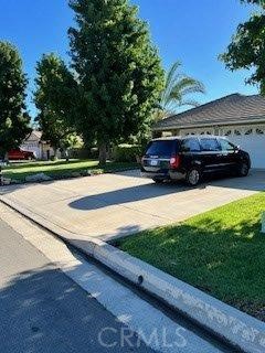 Charming single-story ranch home on over ¾-acre lot in a desirable, tranquil area of Lake Elsinore! This horse-friendly property offers 4 bedrooms, 2 bathrooms, and a remodeled kitchen with updated finishes. Spacious living and family rooms provide a comfortable layout, perfect for entertaining. Enjoy partial distant lake views and plenty of room to roam outdoors. Features include RV access and parking, a 3-car garage, central A/C and heat, and a cozy fireplace. Ideal for those seeking space, privacy, and rural charm with convenient access to city amenities. Zoned for horses—bring your animals, toys, and imagination!