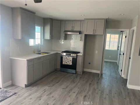 Photo of 10840 Van Ruiten Street, Norwalk, CA 90650 (MLS # PW26078335)