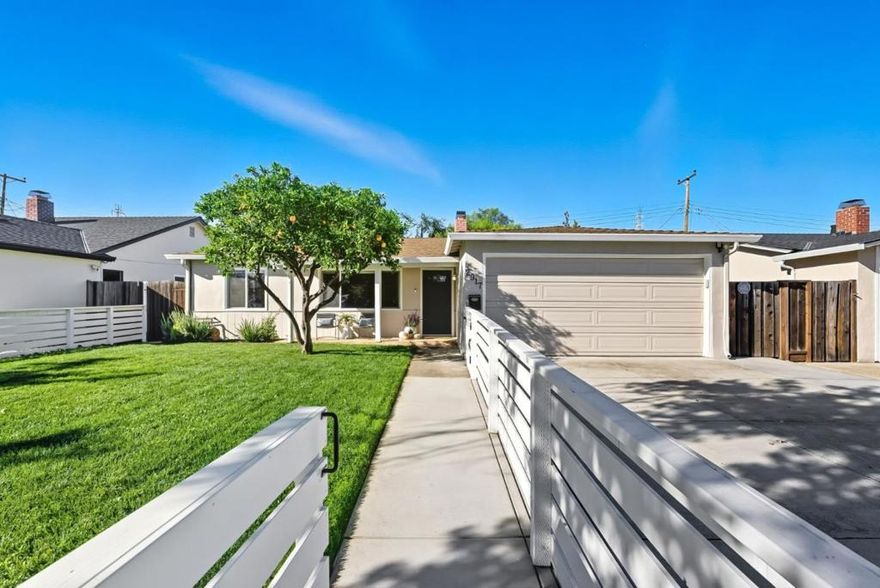 This inviting 4-bedroom, 2-bath home blends modern upgrades with everyday comfort. The 2024 primary bathroom remodel adds a touch of luxury, complemented by new LVP flooring and stylish light fixtures throughout. Spacious dining and family rooms offer plenty of space to gather and entertain. Major system upgrades include a 200-amp electrical panel, premium Bryant 5-stage variable speed heat pump with new ducts and vents, newer appliances, water softener, reverse osmosis system, and newer water heater. Smart features abound with a Bryant thermostat, Google Nest doorbell, Lutron Caseta lighting, Rachio sprinkler controller, and ChargePoint EV charger. Thoughtful details include recessed lighting, custom closets, cordless cellular shades, and an electric fireplace. A fully fenced front yard, two-car garage, and proximity to local schools and the park make this home the perfect blend of comfort, style, and convenience.