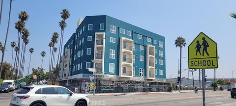 Photo of 3839 W Washington Boulevard #1, Los Angeles, CA 90018 (MLS # AR26030546)