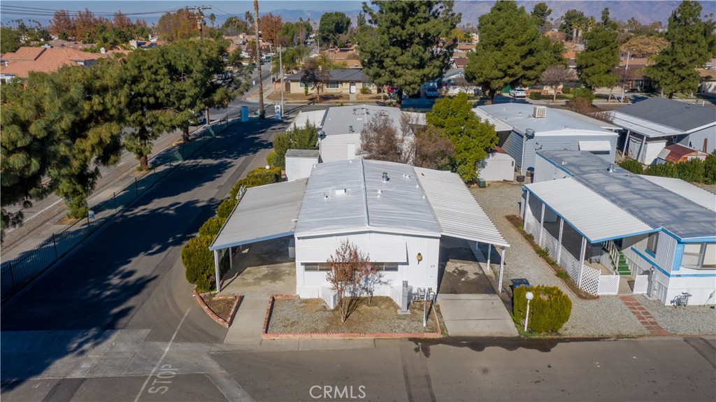 I can't believe this magnificent unit#25 in London Spires of Hemet's 55+ mobile home community! this is the one you've been waiting for! With many upgrades in the kitchen area, you'll find KITCHEN CABINETS, GRANITE COUNTERTOP, STOVE, UNDER CABINET RANGE, UNDERMOUNT DOUBLE BOWL SINKS, LIGHTS, CHROME FAUCET WITH A MOTION ACTIVATION AND A SINGLE-HANDLE PULL DOWN SPRAYER. WE ALSO HAVE WATERPROOF VINYL FLOORING, SLIDING GLASS DOOR, BASE AND ACCENT AND DECOR MOLDING, FIRE ALARMS DETECTORS, CARBON MONOXIDE DETECTORS, AND SMOKE DETECTORS, VENT COVERS, , BATHROOMS MIRRORS, BATHROOM LIGHTING, SINK FAUCETS, AND SHOWER FIXTURES, INTERIOR AND EXTERIOR PAINT, WHITE ROOF COATING OF SILICONE FOR LONG-LASTING WATER RESISTANCE AND WATER PONDING RESISTANCE. SPACE RENT IS $630.3/month. Management that is very Professional and Friendly. Community offers a Rec-Room that can be rented out for all your special events, Library, Laundry Room, Billiards, Exercise Room, Club House that features a TV and Kitchen—heated Pool and Jacuzzi with a BBQ area that features 2 large BBQ grills. Saunas are located in each of the ladies' and Gentlemen's restrooms. Come and see all that this community has to offer. This cute home is ready to move in and is waiting for you. The owner may carry the note or accept payments with a good-sized down payment. This home is a winner. Make it yours!