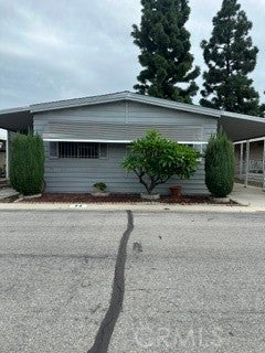 Photo of 8509 94 Beverly Blvd. BLVD, Pico Rivera, CA 90660 (MLS # DW26220489)