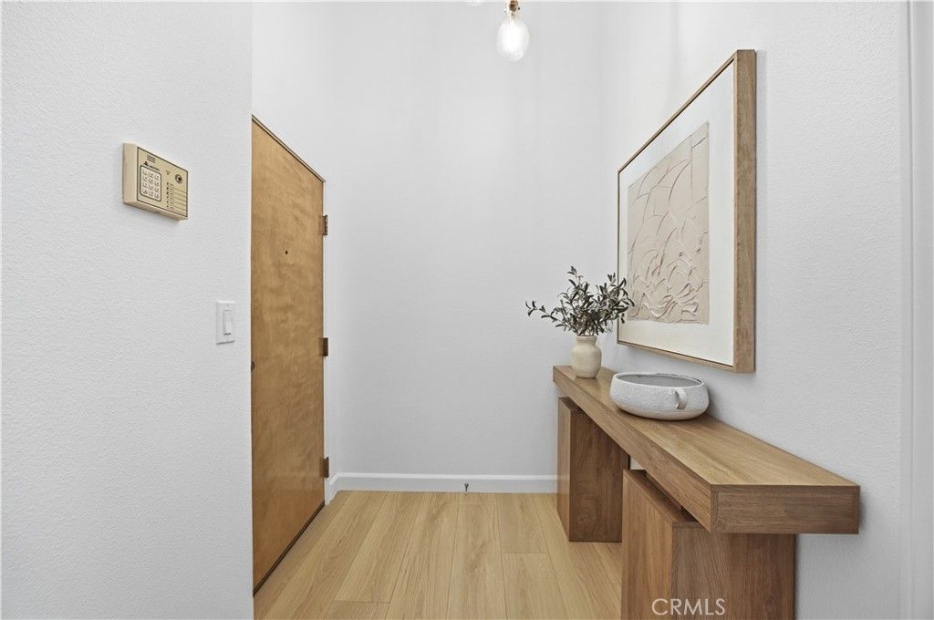 Photo of 11737 Darlington Ave Ave #305, Los Angeles, CA 90049 (MLS # SB26076736)