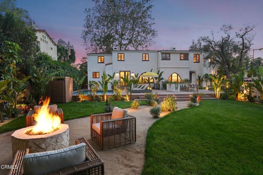 Exactly 100 years later, 620 S Allen Ave proves that exquisite design always stands the test of time. This 1925 Spanish Colonial Revival by architect Everett Phillips Babcock has been meticulously renovated over the past three years into something truly spectacular. Blending historic charm with luxurious modern updates, the home invites you to live exceptionally--without compromise. Set in the exclusive Huntington Library District, this stately residence stands proudly among San Marino's finest estates. Inside, graceful archways, exposed beams, and wide plank oak floors frame light-filled, elegant interiors. The sweeping formal living room impresses with a soaring cathedral ceiling, perfect for lively gatherings and evening champagne toasts. Just beyond, the cozy family room and its Gothic arch windows offer the perfect place to unwind. The kitchen is a true showpiece: Italian marble counters, Wolf and Sub-Zero appliances, and custom Italian cabinetry create a space as stylish as it is functional. Enjoy meals in the sunlit dining room overlooking the lush backyard. Five bedrooms include a guest room downstairs and a luxurious upstairs primary suite with spa-like bath and massive walk-in closet. Each additional bedroom has its own en suite for added privacy.  Sited on an expansive 3/4 acre lot, the grounds offer wonderful amenities in a private and picturesque setting that feels like your own luxury resort.  Invite friends over for a tennis tournament on your pristine, regulation size court, then heat up the built-in grill for a care-free barbecue on the massive wood deck before cooling off with a dip in the saltwater pool/spa. Whether hosting a black tie charity gala or a jubilant summer pool party, you have the perfect venue right in your backyard. The grounds also include a versatile studio, easily used as an exercise space or game room. More than just a legacy home that surrounds you with beauty, 620 S Allen Ave is your invitation to an entirely new world of daily joys for you and those you love most.