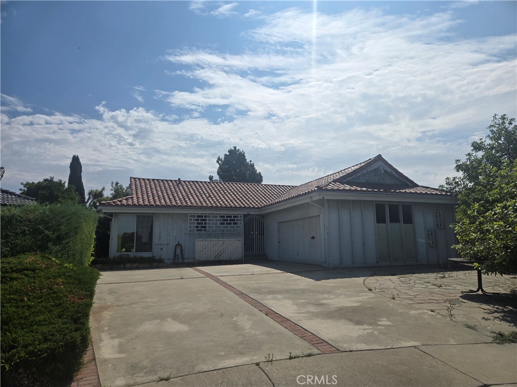 Location! Location! Location! 3 Bedroom 2 Bath Home in the beautiful neighborhood of Monterey Park Highlands. City Light Views! Mountain and Canyon Views! Sparkling pool looking over the city lights. Located at the end of a cul-de-sac Lots of fruit trees (Orange tree, Guava, Avocado, Persimmons and lime). This home needs updating and is ready for you to make it your own. Great area to raise a family with high-ranking schools. Come and see and bring the family!
