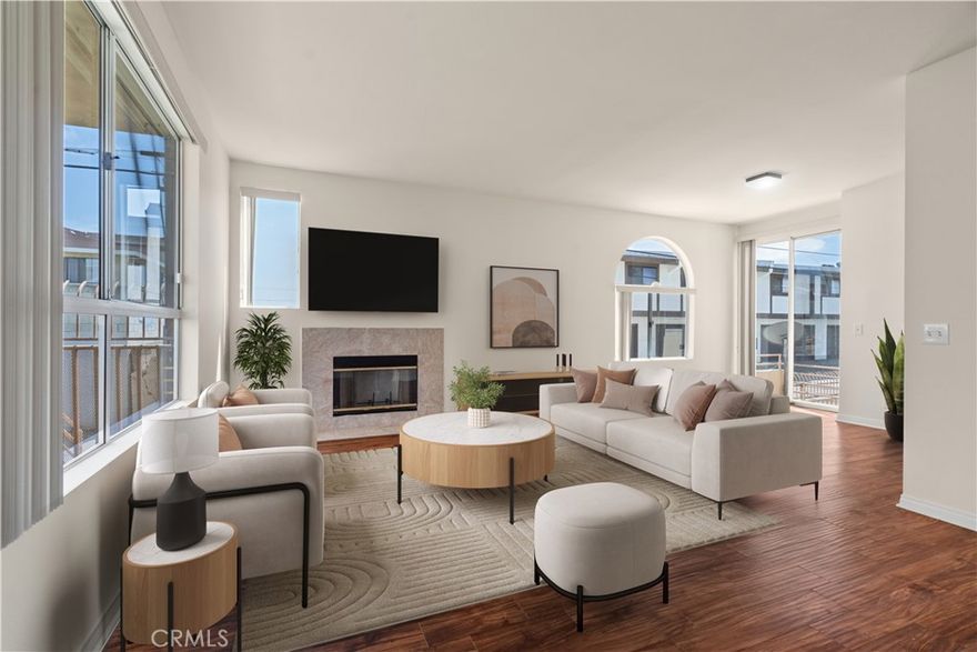 SELLER HAS ASSUMABLE VA LOAN FOR QUALIFIED BUYERS! SECURE YOUR DREAM HOME NOW! JUST REDUCED| NEW PRICE!! Discover the epitome of modern living in this stunning 3-bedroom, 2.5-bathroom townhome located at 14540 Yukon Ave in East Hawthorne. Thoughtfully designed, this residence offers a generous main living area, perfect for hosting gatherings, featuring an inviting fireplace and a convenient wet bar. The open-concept kitchen and dining area facilitate seamless interaction, allowing you to engage with guests while preparing meals. The laminate flooring in the main living area ensures easy upkeep and a polished look. Upstairs, you’ll find all three bedrooms, each boasting remarkable vaulted ceilings that enhance the spacious feel. The primary bedroom serves as a peaceful retreat with abundant room for relaxation and includes a large en-suite bath for added luxury. Additional features include an oversized two-car garage, providing ample space for storage and parking, and a cozy patio adjacent to the kitchen, perfect for enjoying outdoor gatherings and a storage room on first floor. Recent updates, including fresh paint and new carpet, make this home move-in ready and waiting for you to add your personal touch. HOA amenities includes trash, secured access and outdoor cooking area. Don’t miss the opportunity to make this exceptional property your own!