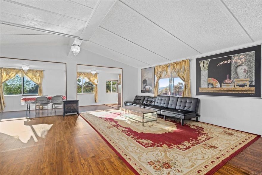 Don’t miss this cozy Anza retreat with plenty of room to spread out. Highlights include permanent foundation/recorded 433a, a spacious living area, permitted additional bedroom and bathroom for growing households or guests. The kitchen’s accent wall adds warmth and character, complemented by kitchen upgrades. Refrigerator, washer, dressers and most furniture including two TVs—can be included in the sale, making the move-in simple. A generous yard offers space for gatherings, and the home sits near paved road for easier access. Property has private well water source and also has city water connection for reliable sources for peace of mind.