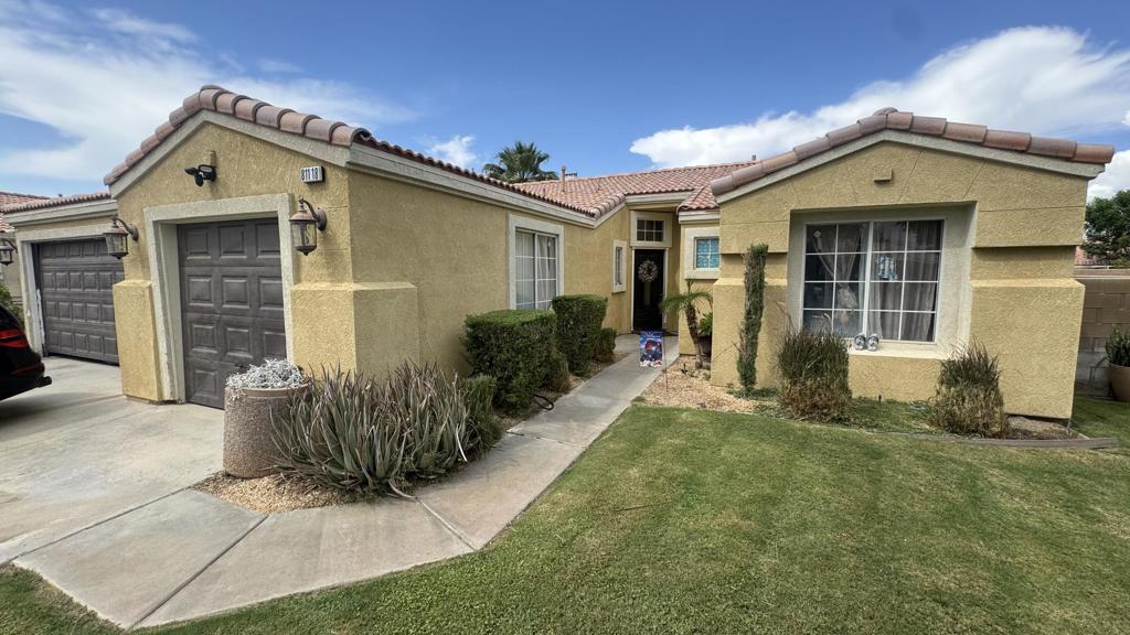 Welcome to this cozy 4 bedroom- 3 bath home conviniently located in a highly sought-after neighborhood in West Indio. This home features high ceilings, spacious living space and kitchen, plenty of natural light and a spacious backayrd. Kitchen and additional living space, there lots of natural light on the family room, This home comes with ample parking area and a 2-car garage. Outside, the backyard is perfect for entertaining with a custom patio. Additional features include title flooring, recessed lighting. This home is perfect for comfortable living and entertaining. Don't miss out on this amazing opportunity! Shops, schools, and festival venues just minutes away. No HOA.
