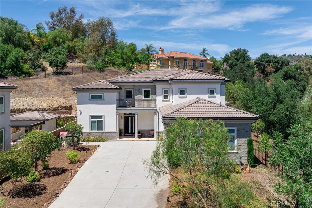 At the pinnacle of Walnut’s most prestigious enclave stands 1330 Waterbrook Circle — a residence that redefines luxury and privacy.
Nestled on an expansive 20,000+ sqft estate lot, this home is a rare sanctuary where modern sophistication meets timeless elegance. The 3,822 sqft interior unfolds with 5 bedrooms and 6 bathrooms, including dual master suites, grand living areas, and natural light that cascades across every corner.
From the commanding curb appeal and private driveway to the vast, hillside-framed backyard, every element has been crafted for those who seek more than a home — but a statement of lifestyle. The grounds invite endless imagination: a sparkling pool, a lush orchard, or an entertainer’s paradise designed entirely to your vision.
Beyond the gates lies the award-winning Walnut School District, ensuring that this residence is not only a private retreat, but also a legacy investment in one of Southern California’s most coveted communities. Don’t miss this rare find — call today to schedule your private tour for your dream home!!!