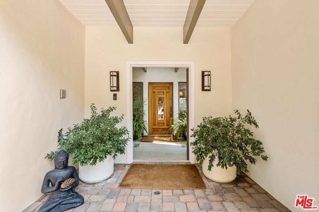 Photo of 13360 Chalon Road, Los Angeles, CA 90049 (MLS # 25602411)