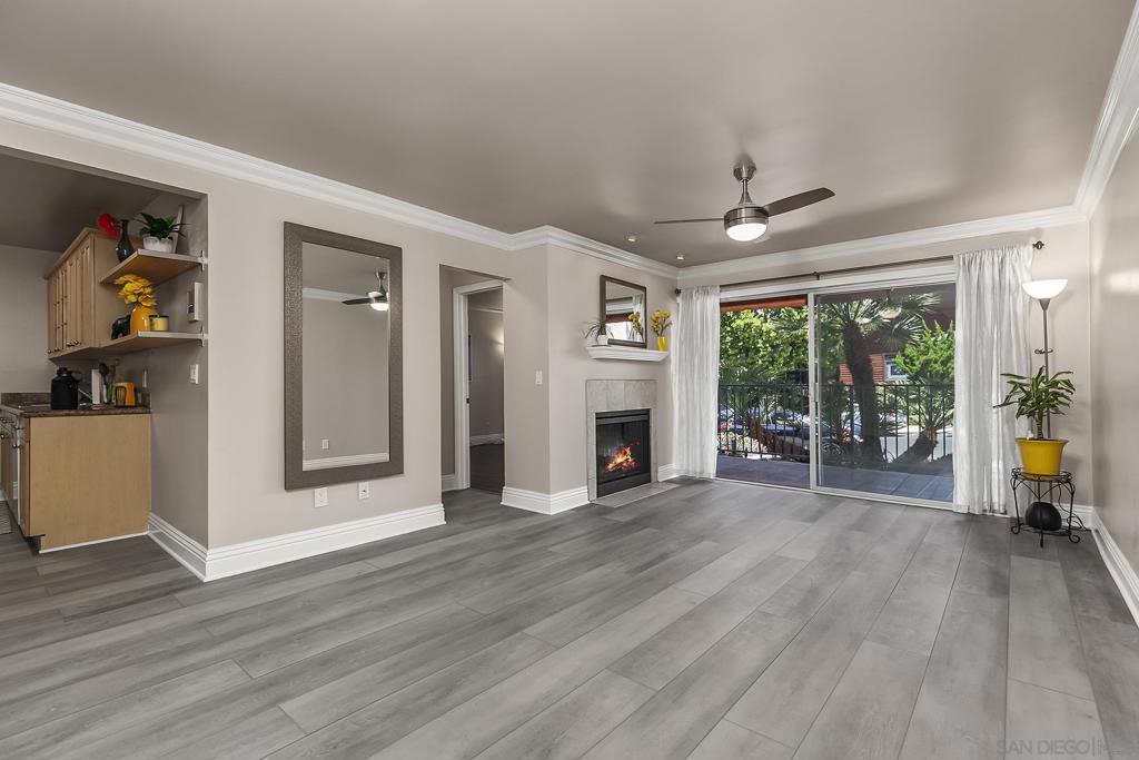 Welcome to Hillcrest! Amazing location, walking distance to all! Rarely available 1Bd/1Ba ground floor residence situated in the highly sought after, Terrace Village community. The unit features an open concept living/dining area w/large private patio. Living room has a fireplace, crown molding + recessed lighting. New LVP flooring in living dining areas. New ceiling fans. Kitchen w/granite counters and new Whirlpool SS appliances. Updated bathroom w/new walk-in shower, rain shower head, light fixture. In-unit washer/dryer. Low HOA fees. Gorgeous sparkling pool. New fitness center. Underground parking. Amazing location! Walk to Balboa park and downtown Hillcrest in minutes. Hillcrest is a quaint, affluent part of the city that prides itself in its diversity. Pedestrian-friendly streets, transit, and a variety of bars, restaurants, coffee shops, and boutiques are all within walking distance. Pet Friendly complex! Complex features a gorgeous sparkling pool with BBQ area, sun deck, lounge chairs, cozy table areas. New fitness center. Underground parking. A Must See!
