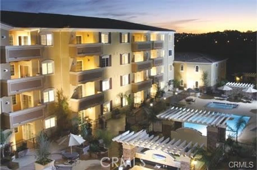 Welcome to this beautifully remodeled 2-bedroom, 2-bath condo in this beautiful 55+ community of Village Court. Filled with sunlight, this third floor with views of Palos Verdes offers both comfort and convenience. Relax on your private balcony and take in the warm sun, cool breezes, and stunning sunrises and sunsets. The open floor plan is perfect for daily living, featuring pristine granite countertops in the kitchen with high-quality stainless steel appliances. The cheerful, bright living room has beautiful wood floors, making it an inviting space for intimate gatherings or a friendly get-together.  The master suite includes a private bathroom, a generous walk-in closet, and beautiful carpeting. The spacious second bedroom is versatile, ideal for guests. The stackable washer/dryer located next to the primary bedroom, bathroom, and walk-in closetis the perfect size and location. Parking is easy with ground-level access and two parking spaces. The coummunity hasing a pool, spa, outdoor fireplaces, seating areas, BBQs, and a community room with a lounge, kitchen, billiards table, and exercise gym. Relax with a good book or start a puzzle in the second-floor HOA lounge. Just steps from the community pool and hot tub, this condo provides a resort-like lifestyle. The welcoming community room offers a perfect space to socialize with neighbors. Situated in a peaceful, well-maintained community, this condo is ideal for those seeking a comfortable, low-maintenance lifestyle. An additional storage locker down the hall (room #300) in a locked HOA storage room is available for your bulky or seasonal items. There are two tandem assigned parking spaces (#61) in the HOA gated common area garage, with ample guest parking available in the Village Court guest parking lot. The HOA dues include Basic Cable with Spectrum and Internet Service. This unbeatable location is close to the beach, a wealth of shopping, restaurants, services, and the Del Amo Fashion Center, making it an exceptional place to call home.