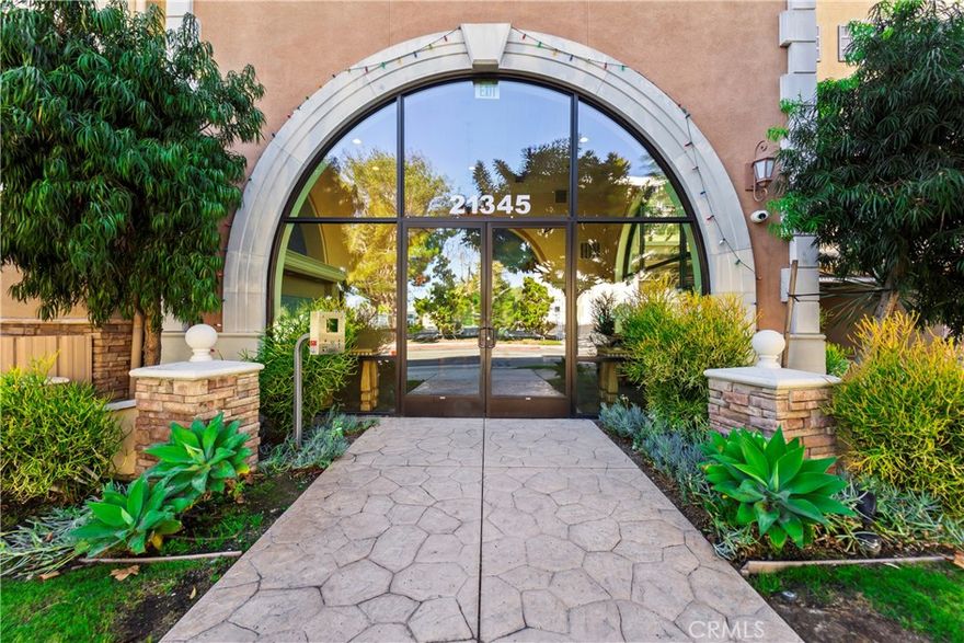 Welcome to this beautifully remodeled 2-bedroom, 2-bath condo in this beautiful 55+ community of Village Court. Filled with sunlight, this third floor with views of Palos Verdes offers both comfort and convenience. Relax on your private balcony and take in the warm sun, cool breezes, and stunning sunrises and sunsets. The open floor plan is perfect for daily living, featuring pristine granite countertops in the kitchen with high-quality stainless steel appliances. The cheerful, bright living room has beautiful wood floors, making it an inviting space for intimate gatherings or a friendly get-together.  The master suite includes a private bathroom, a generous walk-in closet, and beautiful carpeting. The spacious second bedroom is versatile, ideal for guests. The stackable washer/dryer located next to the primary bedroom, bathroom, and walk-in closetis the perfect size and location. Parking is easy with ground-level access and two parking spaces. The coummunity hasing a pool, spa, outdoor fireplaces, seating areas, BBQs, and a community room with a lounge, kitchen, billiards table, and exercise gym. Relax with a good book or start a puzzle in the second-floor HOA lounge. Just steps from the community pool and hot tub, this condo provides a resort-like lifestyle. The welcoming community room offers a perfect space to socialize with neighbors. Situated in a peaceful, well-maintained community, this condo is ideal for those seeking a comfortable, low-maintenance lifestyle. An additional storage locker down the hall (room #300) in a locked HOA storage room is available for your bulky or seasonal items. There are two tandem assigned parking spaces (#61) in the HOA gated common area garage, with ample guest parking available in the Village Court guest parking lot. The HOA dues include Basic Cable with Spectrum and Internet Service. This unbeatable location is close to the beach, a wealth of shopping, restaurants, services, and the Del Amo Fashion Center, making it an exceptional place to call home.