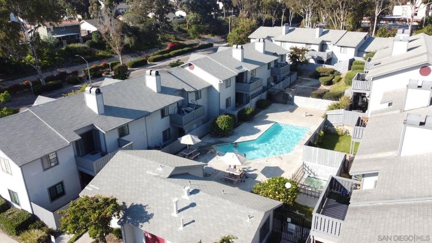 Seller will pay your HOA fees for the rest of 2025 on this rare Chula Vista condo with a private yard and a detached garage! This ground-floor 2BR/2BA corner unit lives like a private home and includes AC, in-unit laundry, and community pool access. Enjoy an unbeatable location with a short walk to all Hilltop schools and easy I-805 freeway access. Future value is bolstered by the nearby $1B+ Gaylord Pacific Bayfront development, cementing this as a smart investment. With the seller providing a massive financial incentive, this unique opportunity won't last. Schedule your tour today!  Discover the rare home that truly offers it all—a private sanctuary where your life finds its perfect, effortless balance. This is your opportunity to own a piece of Chula Vista that masterfully combines the ease of community living with the coveted space and privacy you crave. Imagine a lifestyle where every convenience is at your fingertips, from a sprawling private yard and modern comforts to world-class amenities and an unbeatable location that simplifies your daily rhythm.  Step inside your air-conditioned haven, a beautifully designed 2-bedroom, 2-bathroom layout that immediately feels like home. The stresses of the day melt away knowing that comfort is guaranteed, while the ultimate convenience of an in-unit washer and dryer and a private detached garage streamlines your routine. The true heart of this home, however, lies just beyond the sliding glass door. Your living space extends to an exceptionally large and private outdoor oasis, a feature rarely found in condo living. Picture your mornings with coffee on the spacious wood deck, evenings entertaining friends on the separate cement patio, and your furry companions playing freely in the surrounding green area, complete with its own charming fruit tree. This is the essence of Southern California living—a seamless indoor-outdoor lifestyle that is an unexpected and cherished luxury.  This home’s location is a masterclass in convenience. The daily rush is replaced by peace of mind, built on a unique directional design. In one direction, a safe and easy stroll takes your children to any of the three highly-regarded Hilltop schools—Elementary, Middle, or High School. Turn the other way, and your own commute becomes a stress-free breeze with the 805 freeway just two blocks from your doorstep, connecting you effortlessly to Downtown San Diego, military bases, and the entire region. This unparalleled access saves you precious time every single day, giving you more moments to enjoy the things that matter most.  Embrace a lifestyle rich with leisure and excitement, starting with a refreshing dip in the sparkling community pool on a sun-drenched afternoon. For the golf enthusiast, the prestigious fairways of the San Diego Country Club are just down the street. Beyond your immediate neighborhood, you are perfectly positioned to experience the thrilling renaissance of Chula Vista. Explore the historic charm of Third Avenue, with its growing collection of craft breweries, unique boutiques, and a diverse culinary scene. Even more exciting, you are just minutes from the monumental Chula Vista Bayfront transformation—Southern California’s next premier waterfront destination. This world-class development is anchored by the spectacular new Gaylord Pacific Resort, a stunning billion-dollar investment that brings with it new public parks, walking trails, and future bayfront dining, establishing your new home at the epicenter of regional growth.  This property represents a unique and fleeting opportunity to own a home that truly checks every box: your own private yard for play and relaxation, the modern comfort of air conditioning and a private garage, and an unbeatable location for both family and work. You truly can have it all—the space you need, the convenience you crave, and a prime stake in a city with an incredibly bright future. Don't let this vision of a richer, easier life slip away.