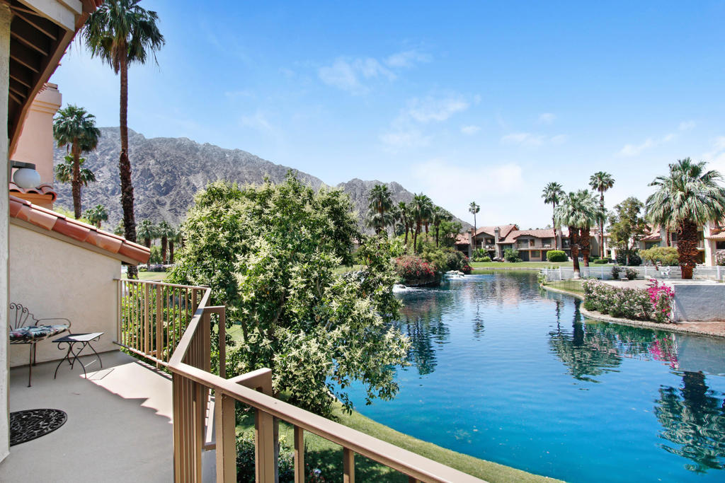 Tucked back in the wonderfully quiet and beautiful PGA West this two-bedroom condominium gives the feeling of lake side living with the enjoyment of the Desert lifestyle. With convenient access to the Tournament Clubhouse, Jack Nicklaus Tournament Course, and the Stadium Golf Courses. Enjoy dinner from the delectable fare or enjoy the high energy Monday Night Football at Ernie's. Leave the car at home in January when you can walk to the famous Amex Open (formerly the Bob Hope). Located only four miles from the Polo Fields you can enjoy your Sunday's brunching and watching polo, or in April enjoy the concerts that come to town! Set up your showing today!