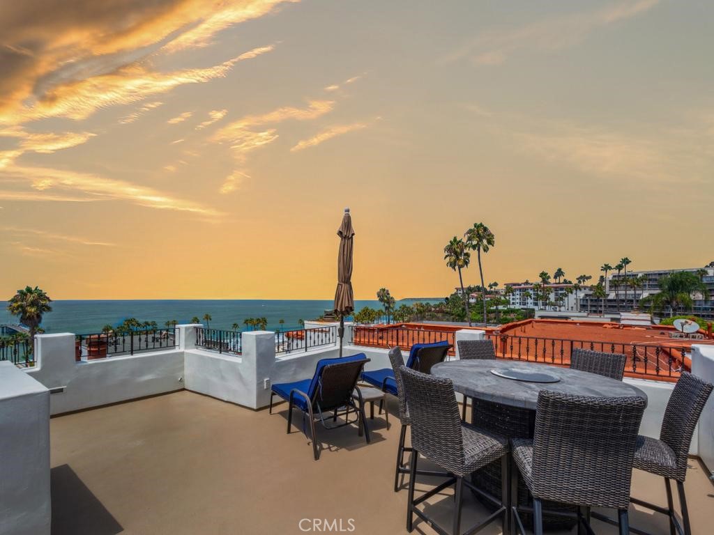 Experience panoramic ocean views from this luxury residence in one of San Clemente’s most coveted locations—just moments from the pier, beach, restaurants, and the vibrant downtown.
Through the foyer, the first level reveals two spacious ensuite bedrooms that create a private retreat. The primary suite showcases a fireplace sitting area, walk-in closet, private balcony, and spa-inspired bath with soaking tub, dual vanities, and walk-in shower, while the secondary suite provides comfort for family or guests.
Convenience is elevated with a private elevator that connects the garage to the main living area, where light-filled spaces frame sit-down ocean vistas. This open-concept level blends the dining and living rooms with a cozy fireplace, while the chef’s kitchen is appointed with KitchenAid appliances, granite countertops, a walk-in pantry, and breakfast counter. Completing this floor is a powder bath and a connected balcony—perfect for al fresco dining, morning coffee, or sunset views.
Crowning the residence, the rooftop deck captures sweeping 180-degree ocean views that define the essence of San Clemente’s coastal lifestyle—an extraordinary backdrop for entertaining, relaxing, or simply taking in the horizon.
