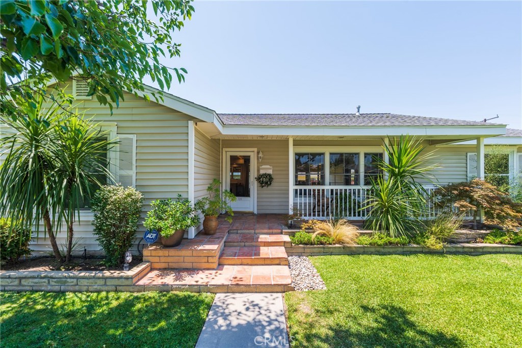 Timeless Charm Meets Modern Luxury: Your Dream Ranch-Style Home Awaits in Downtown Anaheim!
Welcome to 729 North Resh Street, a truly stunning ranch-style home where classic design meets exquisite modern finishes, offered at $899,900.
This home sits on a generous 6,956 sq ft lot with a beautiful, lush green front lawn and a charming full front porch. The smooth ceilings and elegant oak flooring guide you through an open floor plan, filled with an abundance of natural light from large windows at the front and back of the home, offering picturesque views of the property.
The gorgeous, remodeled kitchen is a chef's delight, boasting high-end finishes and appliances. Both bathrooms have been beautifully updated, including a private primary bath with a walk-in shower and a hall bath featuring a new bathtub and stunning tile to the ceiling.
Step outside to discover a true outdoor oasis. A gorgeous, long covered back porch with ceiling fans and sun shades provides the perfect space for year-round entertaining. This opens up to a huge backyard with plenty of grass and a two-car detached garage. The convenience is unmatched, with a rolling gate for easy vehicle or delivery access from the alley.
With central air and heat, newly remodeled kitchen and bathrooms, and fresh paint throughout, this move-in-ready home built in 1950 offers the perfect blend of style, comfort, and prime Downtown Anaheim living.
Just a few blocks away from Pearson Park, Center Street Promenade and the Anaheim Packing District.
