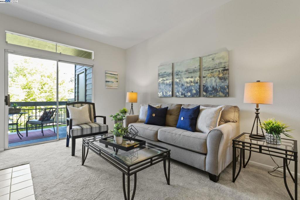 Welcome to this beautifully refreshed lower-level condo in the highly sought-after Canyon Meadows community! This inviting home features fresh paint and brand-new carpet, offering a clean and modern feel throughout. The bright and open floor plan seamlessly connects the living spaces, while the unit backs to a peaceful community greenbelt with no rear neighbors, providing added privacy and tranquility. This homes comes with two balconies, one off of the living room, and the other off of the primary bedroom with amazing and serene views! Enjoy the convenience of a 1-car enclosed garage plus an additional assigned parking space and access to a wealth of resort-style amenities, including two sparkling pools, relaxing hot tubs, basketball and volleyball courts, tennis courts, a clubhouse with gym, and a designated car wash area. Perfectly located near major commuter routes, BART stations, restaurants, downtown...this home offers the ideal blend of comfort, community, and convenience.