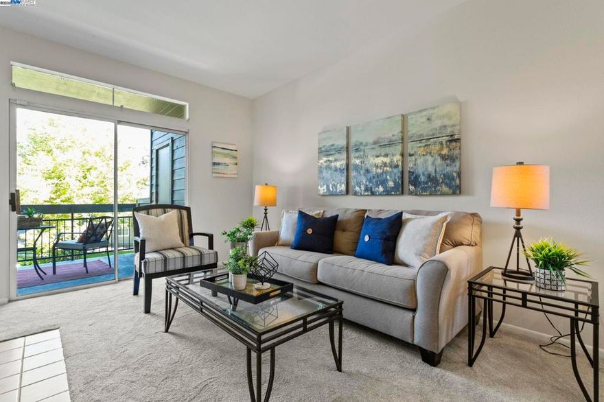 Welcome to this beautifully refreshed lower-level condo in the highly sought-after Canyon Meadows community! This inviting home features fresh paint and brand-new carpet, offering a clean and modern feel throughout. The bright and open floor plan seamlessly connects the living spaces, while the unit backs to a peaceful community greenbelt with no rear neighbors, providing added privacy and tranquility. This homes comes with two balconies, one off of the living room, and the other off of the primary bedroom with amazing and serene views! Enjoy the convenience of a 1-car enclosed garage plus an additional assigned parking space and access to a wealth of resort-style amenities, including two sparkling pools, relaxing hot tubs, basketball and volleyball courts, tennis courts, a clubhouse with gym, and a designated car wash area. Perfectly located near major commuter routes, BART stations, restaurants, downtown...this home offers the ideal blend of comfort, community, and convenience.