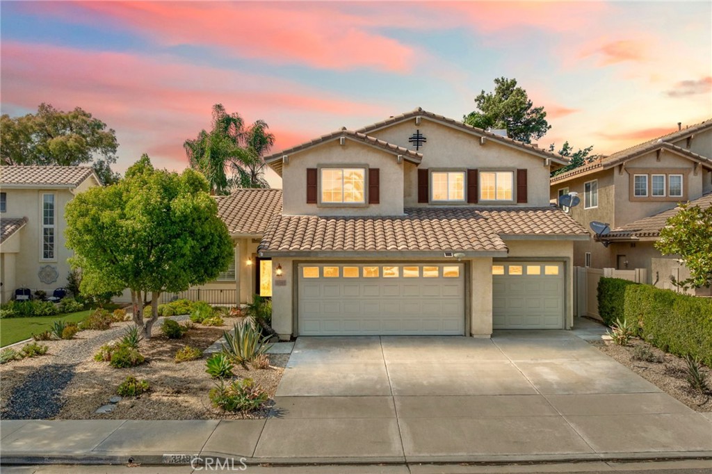 Discover this stunning 5-bedroom residence, perfectly situated on a private cul-de-sac with no rear neighbors, offering serene city views from the master bedroom balcony. This home has undergone extensive, high-quality renovations, presenting an immaculate "model home" aesthetic. Step inside to an interior transformed with luxurious LVP flooring throughout both main and upper levels, and elegant plantation shutters on the main floor. The heart of the home, the kitchen, boasts sleek granite countertops and all-new stainless steel appliances, creating a chef's dream. Every bathroom has been beautifully updated with new vanities and modern fixtures. Enjoy the bright ambiance created by new LED lighting installed throughout the entire home, complemented by new mirrored closet doors in all bedrooms. Adding to the home's comfort and efficiency is a newer HVAC and heating system, ensuring year-round climate control, and a whole-house water softening/filtration system for superior water quality. The thoughtfully designed layout includes a convenient downstairs office (currently serving as the 5th bedroom) and a versatile loft upstairs, providing ample space for relaxation, work, or hobbies. The separate downstairs laundry room offers added convenience. The professionally landscaped exterior is an entertainer's paradise. The spacious backyard features a harmonious blend of concrete and turf, a new automated irrigation system, and newly planted drought-tolerant vegetation, including numerous privacy trees. Enjoy outdoor living under the alumawood patio cover and readily available 220 & 110 outlets for a future spa – there's plenty of room to add a pool and spa! A three-car garage provides abundant parking and storage. Residing in the highly desirable Vintage Hills community, you'll have access to two beautiful pools, a spa, a clubhouse, and extensive walking trails. This prime location is just minutes from Temecula's renowned award-winning wineries and top-rated schools.