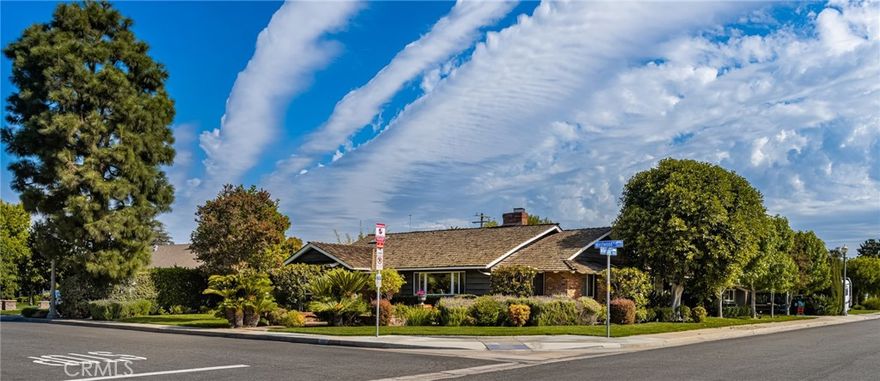 WOW...Customly Decorated Westmont Beauty!  Tucked into a quiet, tree-lined street in one of Anaheim’s most established neighborhoods, 700 N. Westwood Place is a timeless home that blends vintage charm with modern upgrades. From its inviting curb appeal to its expansive backyard oasis, this residence offers the perfect canvas for comfortable living and entertaining.  Built in 1955, this elegant single-story home offers 3,191 square feet of living space on a generous 0.29-acre lot.  Step inside to discover a warm and welcoming interior where natural light dances across the hardwood floors. The spacious living room features a classic picture window, lovely fireplace, crown molding and recessed lighting, flowing seamlessly into a beautifully appointed dining room ideal for family gatherings or intimate dinners. The updated kitchen is a true standout—boasting tile countertops, tons of cabinetry, built in appliances included a vintage built-in oven.  Walk into the outstanding den with floor to ceiling brick fireplace, wood beamed ceilings, travertine tile flooring and sliding glass door out to the secluded patio area.  There are 4 generously sized bedrooms including your primary suite all with ample closet space and custom features.  The 2.5 bathrooms each have their own charm with vintage tile and double sink in the primary bathroom.  Tons of built in storage space, ceiling fans throughout, HVAC and too many custom features to mention.  Step out to your private backyard sanctuary including a completely fenced yard, mature landscaping, refreshing pool area, multiple patios and outdoor dining area. There is also a detached 2-car garage complete with a bonus room that could be utilized as  a perfect space for a home office, 5th bedroom, gym, playroom, or creative studio and a long driveway for multiple cars or potential RV parking.  This home's prime location is just minutes from Disneyland, the Anaheim Packing House, and Downtown Anaheim, which offers unbeatable access to shopping, dining, entertainment, and major freeways. Whether you're commuting to work or exploring the best of Orange County, everything is within reach.