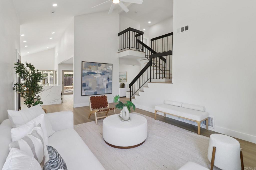Freshly Renovated and Better Than Ever, Now at an Improved Price! This Rancho Peñasquitos home has been reimagined to offer the perfect mix of modern upgrades and suburban comfort. Thoughtfully redesigned from top to bottom, it’s ready to deliver the lifestyle you’ve been waiting for in one of San Diego’s most desirable neighborhoods. The centerpiece of the home is a chef-inspired kitchen that flows seamlessly into the living and dining areas. Quartz counters, full-height backsplash, premium appliances, and soft-close custom cabinetry make it just as perfect for everyday living as it is for entertaining. All bathrooms have been rebuilt with designer finishes including sleek tile, quartz vanities, and frameless glass showers. Throughout the home you’ll find smooth ceilings, wide-plank LVP floors, new doors and trim, upgraded lighting, and smart electrical updates for added peace of mind. Outside, enjoy a freshly landscaped yard with a cozy fire pit. The exterior has new stucco and paint, a welcoming front door, and an epoxy-finished garage. Located within the award-winning Poway Unified School District, with parks, trails, and easy freeway access close by, this home makes it simple to enjoy the best of San Diego living. Move-in ready, fully refreshed, and now offered at an improved price.