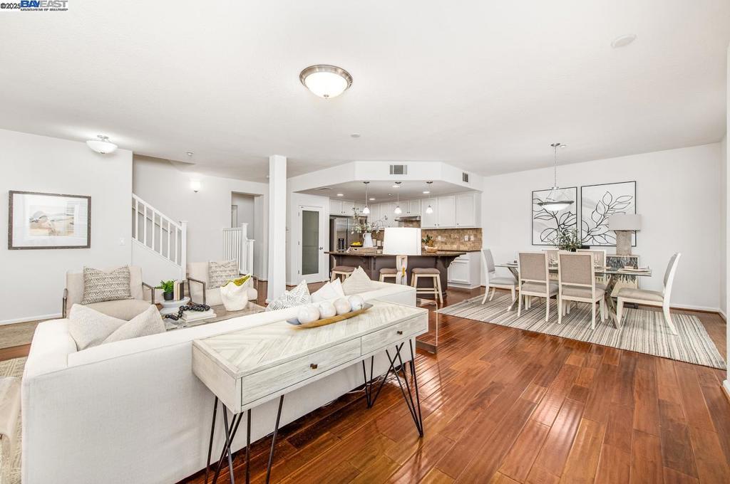 This stunning townhome in Livermore’s award-winning Montage neighborhood checks every box. With 4 spacious bedrooms, 3.5 bathrooms, and 2,190 square feet of beautifully designed living space, it’s the perfect blend of function and flair. Inside, you’ll find rich hardwood floors, a sunlit open-concept layout, and a chef’s kitchen featuring granite counters, stainless steel appliances, and bar seating—ideal for entertaining or everyday living. The layout is incredibly versatile, with a full bedroom and bathroom tucked away on the third floor—perfect for guests, a bonus room, a home office, or creative retreat. Attached two car garage. Step outside and enjoy warm summer nights on the private patio, or take advantage of the community’s amenities with a beautiful swimming pool and gym. Prime location—just minutes from shopping, dining, downtown Livermore, and major commuter routes including 580, 84, and BART.