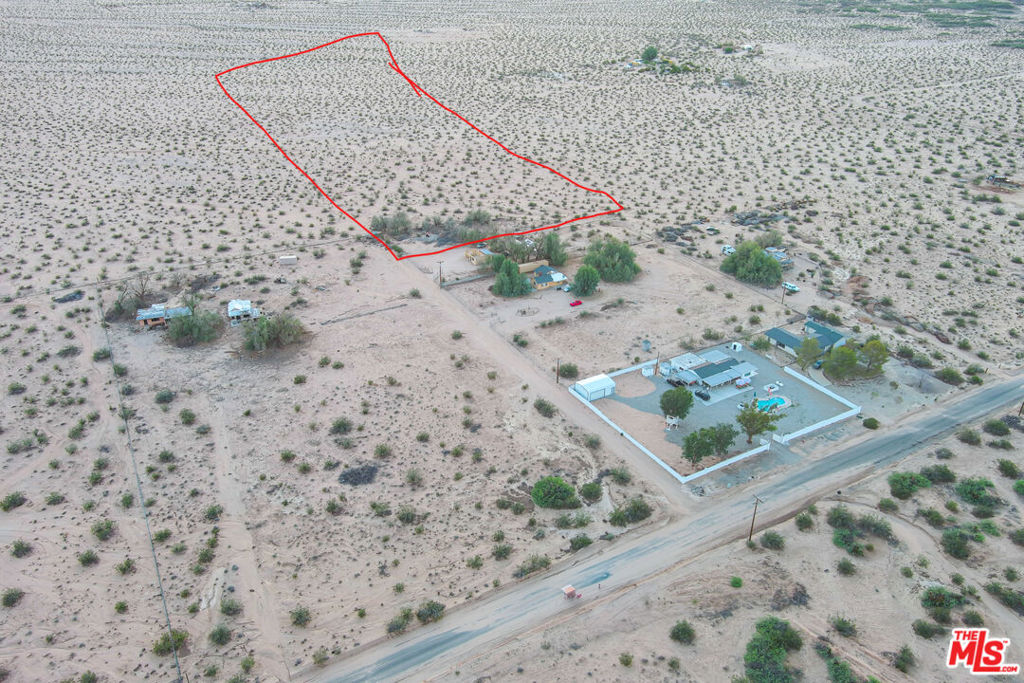 Outstanding 5.41-acre parcel located at the intersection of Mesquite Springs Road and Valle Vista Road in Twentynine Palms. With approximately 235,659 square feet of flat, buildable land and RL-5 zoning, this property is ideal for a custom desert home, ranch-style living, or long-term investment. RL-5 zoning allows for rural residential development with plenty of space for privacy, accessory buildings, or recreational use (buyer to verify). Conveniently located just minutes from downtown Twentynine Palms, local schools, and Joshua Tree National Park, this parcel offers both accessibility and seclusion in one of the High Desert's most promising growth areas.