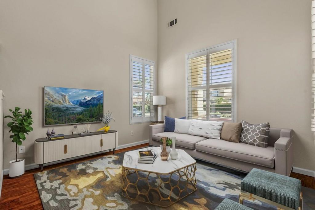 Don't miss this incredible opportunity to live in a stunning 4-bedroom, 2.5-bath home in the desirable Olde Ivy Community with The Legends floor plan. Offering 1,856 sq. ft. of spacious living on a 5,100 sq. ft. lot, this home is filled with natural light and an abundance of windows accented by plantation shutters throughout. The open-concept kitchen and family room, complete with a cozy gas fireplace, create the perfect space for relaxing and entertaining. The kitchen is a chefs delight, featuring granite countertops, a breakfast bar, pantry, and ample cabinetry, plus modern appliances including a gas range, refrigerator, and water softener. New grass on sprinklers, gardener included.