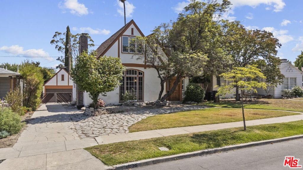 Welcome to this beautifully updated 4-bedroom, 2-bath residence, offering over 2,650 square feet of thoughtfully designed living space. Nestled in a peaceful, family-oriented neighborhood just minutes from Colorado Boulevard's shops, restaurants, and entertainment, this home seamlessly blends classic architecture with modern convenience. Explore inside to a sunlit living room featuring dramatic wood-beamed ceilings, oversized picture windows, and a stunning Spanish-style fireplace. Authentic hardwood floors, wrought iron accents, and colorful tilework celebrate the home's original charm while recent renovations bring added comfort and functionality. The main level hosts three spacious bedrooms and a full bath, while a newly added upper-level primary suite offers a private retreat complete with dual walk-in closets and enough space for a private sitting or media area. The updated kitchen includes stainless steel appliances, bright countertops, and an adjacent laundry area for everyday ease. Outside, enjoy a generous backyard ideal for relaxation or play, along with a detached 2-car garage and ample driveway parking. The property has been professionally cleaned and restored following the Eaton fire. Central heat and A/C, new roofing, and updated fixtures throughout make this an exceptional lease opportunity in one of Pasadena's most desirable pockets.