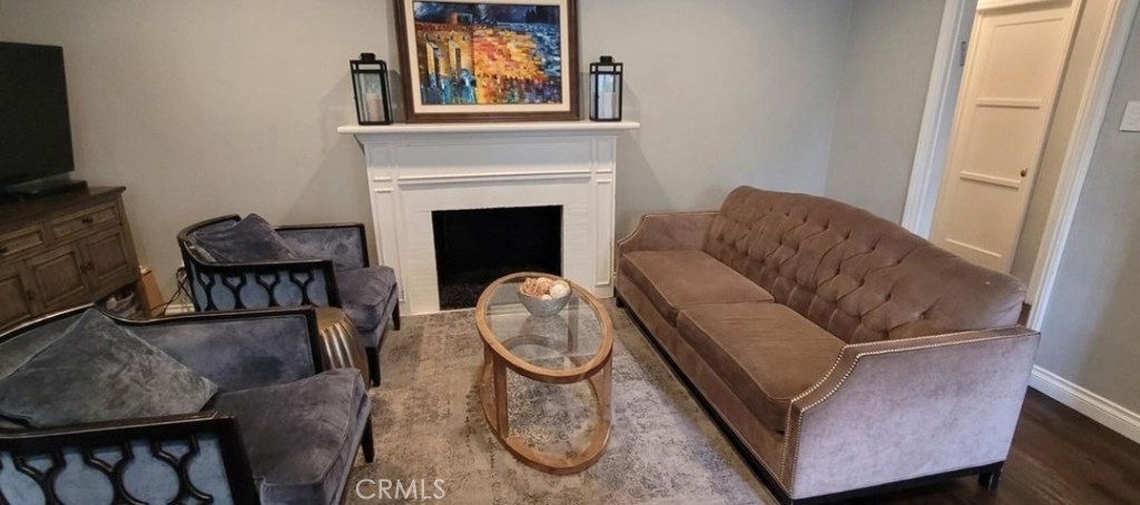 Beautiful home in Valley Village on a tree lined street. Natural light throughout along with dual paned upgraded windows with security locks. Lots of storage space in the closets, walk-in closet with built-in shelves in one bedroom. Appliances are included. Central air & heat with hardwood floors throughout. Large lot with drip irrigation, packed with fruit trees, roses, half-court with in-ground basketball hoop. In addition, there's a turf area with a swing set and trampoline. Beautiful stamped concrete area assigned to large patio and outdoor lounge area. Entertainers delight. Recessed lighting in common area along with beautiful molding. Two beautifully remodeled gas burning fireplaces along with a brant new A/C unit. There is also a separate detached ADU but with a separate entrance and it's own address.