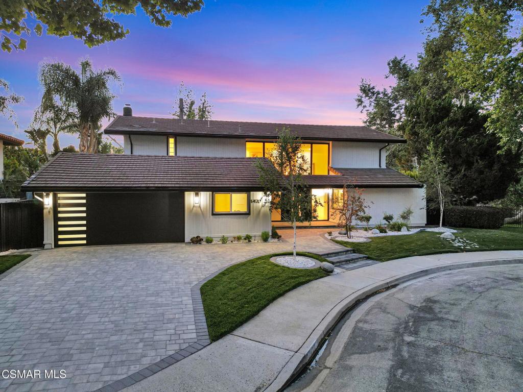 Step into this gorgeous, completely remodeled modern masterpiece located in the heart of Foxmoor, one of Westlake Village's most coveted neighborhoods. Situated on a peaceful cul-de-sac RIGHT NEXT to the greenbelt, this home has been fully upgraded from top to bottom with a fresh modern aesthetic and recreated to illustrate the California lifestyle, with seamless indoor-outdoor living and entertaining at its absolute best! As you approach, you are welcomed by the BRAND NEW charcoal paver driveway and walkway with lush green landscaping. The flooring in this home is European white oak engineered wood with wide 9'' planks and NEW custom cabinetry all throughout. The expansive entryway reveals soaring ceilings, a beautiful modern gold light chandelier, marvelous white oak staircase and a new open concept design. The exquisite designer kitchen is a chef's dream, boasting Vadara quartz countertops, high-end Viking appliances, and a massive island with waterfall edges. Harmonious indoor-outdoor entertaining awaits with spacious living and dining areas that open through bifold doors to a beautifully landscaped backyard. Completing the first floor is a full bath with a newly added standing shower, office and laundry room, leading into the finished garage with crisp epoxy floors. Upstairs you will love the spacious primary suite, plus three bedrooms, and secondary bathroom. The primary suite is equipped with vaulted ceilings, 2 large closets, a newly expanded and reimagined spa-like primary bathroom with a huge walk-in shower, double vanity and make-up station. Enjoy peace of mind with fully permitted upgrades to the electrical, plumbing, and HVAC systems. This home is just steps away from award-winning Westlake Elementary, with wonderful shopping and restaurants close by. Experience luxury living where no expense was spared. Welcome to your new home!